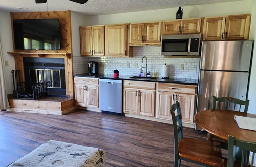Mancelona Condo | 2 BR 2 bath Sleeps 6 Private outdoor association pool, close to Torch Lake, wifi