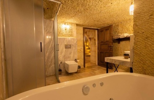 Mustafapasa Hotel | 2 Cave Suites Overlooking Seraphim’s Lush, Peaceful Garden, Pool and Dining!