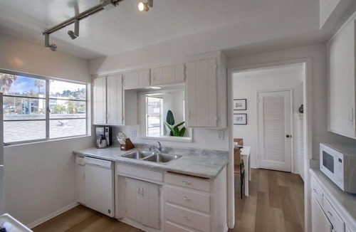 Beach Barber Tract Condo | 2 Dog Friendly Units + 2 Garages + Ocean 1 Block