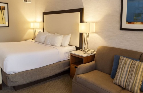 Downtown Resort | 2 King Units for 8! Relaxing Pool, Steps from Golf Course!