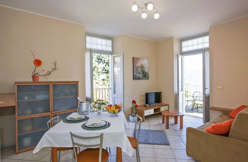 Carciano Apartment | 2-room apartment with balcony and terrace in an Art Nouveau villa with communal pool