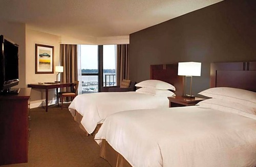 Nassau Bay Hotel | 2 Serene Rooms with Marina Views, Ideal for Family Getaways