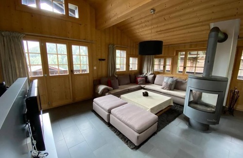 Grimentz Apartment | 2 storey apartment with 4 bedrooms and sauna for 9 persons : living room with woodstove - kitchen wi