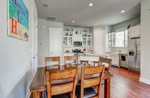 Sailhouse House | 2-story dog-friendly home with balcony, W/D, gas grill & on-site outdoor pool