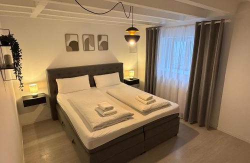 Sundheim Apartment | 2-Zimmer Souterrain Wohnung