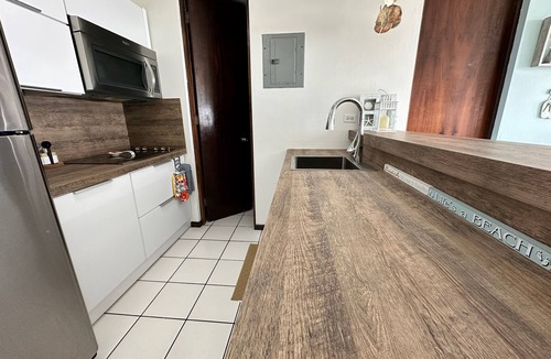 Guanajibo Condo | 20 steps from the beach! WiFi, fully airconditioned, gated community, sleeps 4