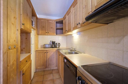 Lanslevillard Apartment | 200m from resort center, fitness, swimming pool, sauna, hammam, balcony, fireplace or stove, tv