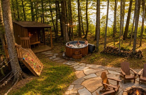 Watersmeet Cabin | 2026 build, off grid,NATURAL PLAYGROUND, inflatables,SAUNA,HOT TUB,pontoon raft