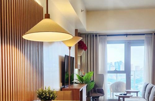 Bonifacio Global City Apartment | 29c BGC Cozy Suite Steps Away From Major Malls with FREE Parking and Gym with Fast Wi-fi