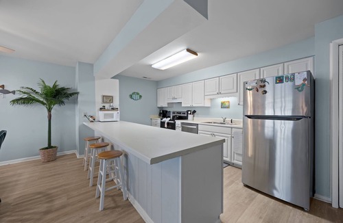 Indian Beach Condo | 2BR/2BA Colony By The Sea with ocean views, elevator & private balcony. Enjoy a king ensuite & twin guest room with TV's, full kitchen, washer/dryer, community pool, hottub, and direct beach access.