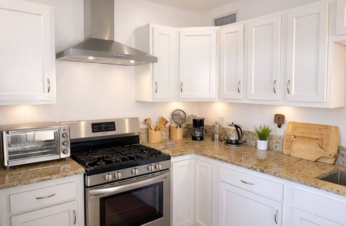 Tucson House | 2BR/2BA Westside Retreat | Kitchen + Backyard Dining