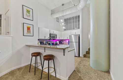 Wholesale District Apartment | 2BR Downtown Gem Arcade games Sleeps 7 Convention Center Stadium