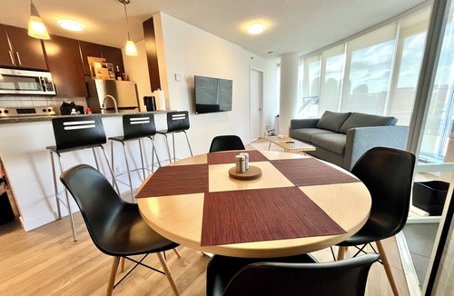Crosstown Apartment | 2BR+Sofabed, 2-Bath, Private 500sqft sundeck, EV Parking w/Pool, Sauna, Hot Tub