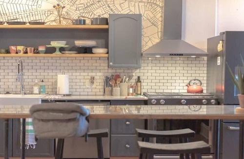 Tower Grove East Condo | 2BR with Workspaces & Deck ABODEbucks