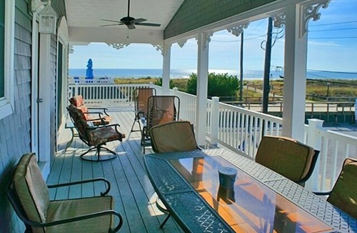 Avalon Condo | 2ND FROM THE BEACH! This property offers expansive ocean views down the coastline