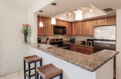Siesta Key Condo | 2nd story end unit with no one above offers light and calm and all the comfort you can hope for !