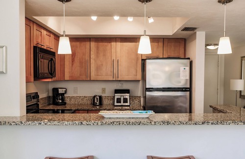 Siesta Key Condo | 2nd story end unit with no one above offers light and calm and all the comfort you can hope for !