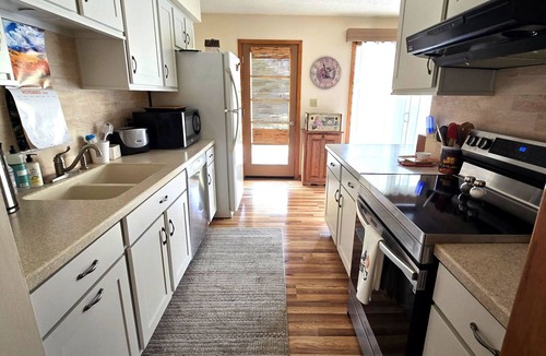 Waldron House | 3-bedroom home in peaceful neighborhood - close to airport, downtown, & stadium.