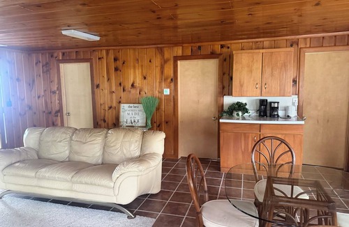 White Cloud House | 3-bedroom lakefront home on All-sports lake with private beach and dock.