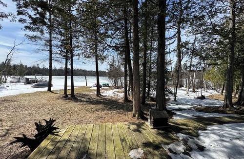 Fife Lake Cabin | 3 bedroom log cabin on the lake. Perfect for ice fishing and snowmobiling!
