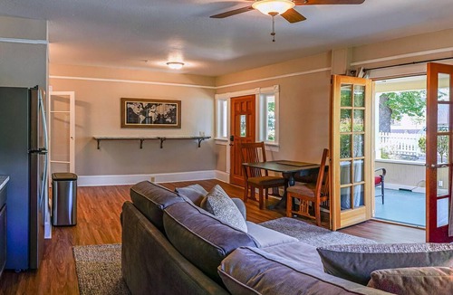Historic Downtown District Apartment | 3 bedrooms include a king and two queen size beds, 2 bathrooms, and kitchenette.