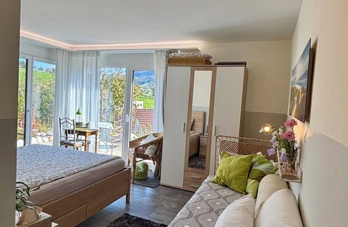 Zullwil Bed & Breakfast | 3 room apartment Villa Sonnglück by the natural swimming pond in the Swiss hiking Jura