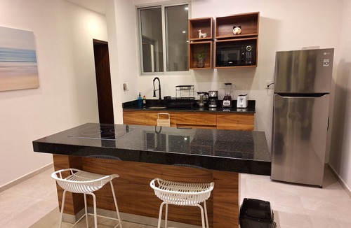 Merida Apartment | 3. Vista al mar turquesa.