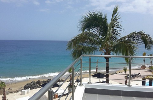 El Batey Apartment | 3BD luxury beachfront condo with gym, elevator, infinity pool. Reduced rate!