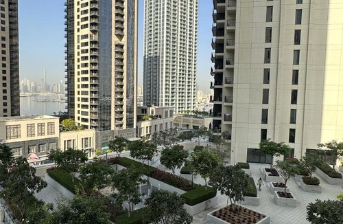 Dubai Apartment | 3BR Haven with Burj Views by MagnoliasVHR