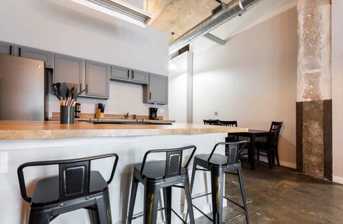 Crossroads Arts District Apartment | 3BR Luxury Historic Loft with Gym