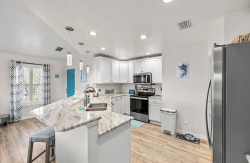 Spring Hill House | 4/2 Pet Friendly Waterfront Home with Hot Tub, Gameroom, Kayaks & Fire Pit