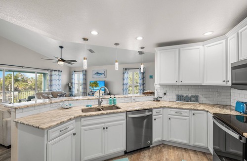 Spring Hill House | 4/2 Pet Friendly Waterfront Home with Hot Tub, Gameroom, Kayaks & Fire Pit