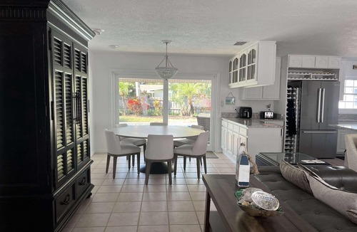Melbourne Beach House | 4/3 Home on A1A with private beach access WiFi, fitness room & heated pool