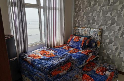 Pluit Apartment | 4 Bed Condo Sleeping by The Sea