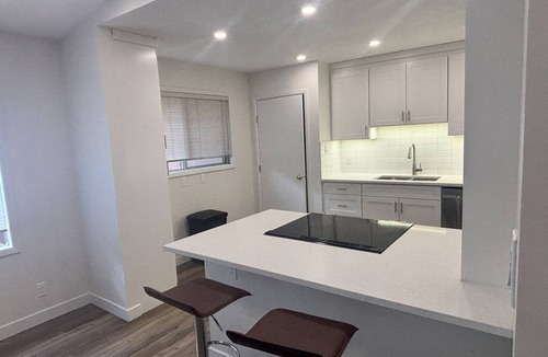 Banff Trail House | 4-bedroom 2-bath bungalow in Charleswood North West Calgary
