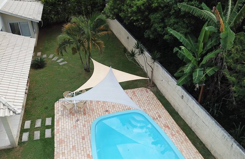 Porto da Lagoa House | 4-bedroom house in a gated community with an ecological trail to the beach.