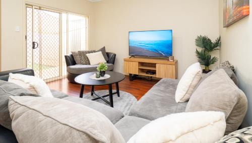 Blakeview Villa | 4 BR Home with Garage- short walk to shops, cafe, dining, and supermarkets