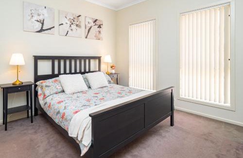 Blakeview Villa | 4 BR Home with Garage- short walk to shops, cafe, dining, and supermarkets
