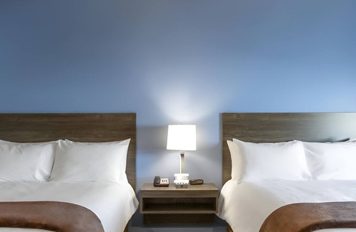 Watertown Hotel | 4 Bright and Inviting Rooms with Full Kitchen to Cook & Relax - Pet Friendly!