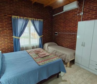 Pergamino Apartment | 4 Estaciones