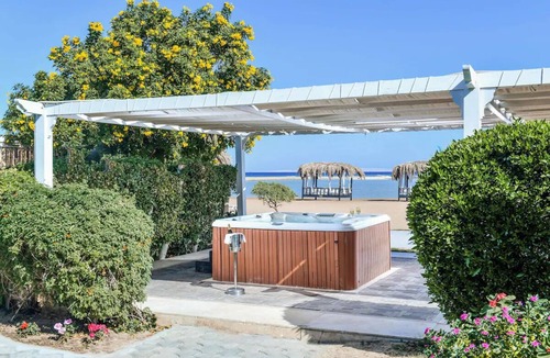 Village Road Resort | 4 Swim-Up Rooms Near Beach, Diving Spots, and Family Activities Onsite