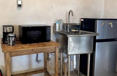 Ojo Caliente House | 40 acre Rustic Adobe Retreat