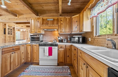 East Jordan Cottage | 45th Parallel - Where Life Is in Balance "Spacious Lakefront Cottage"