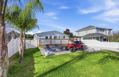 Palm Coast House | 4BR Coastal Pool Cottage Golf Cart Kayaks