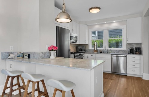 Rumson Cottage | 4BR Rumson Cottage with Back Porch Water Views, Steps to Beach & Town