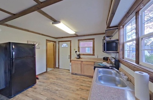 Indian Point Cabin | 4BR Waterfront Cabin w/Hot Tub, Spit Level, Pool + Swim & Boat dock