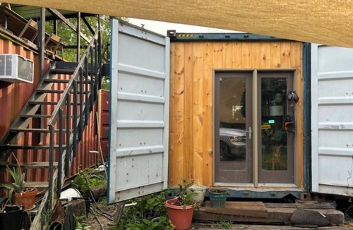 Detroit Villa | 5 acre SECLUDED tiny house village SWIMPOND! 5 mins from downtown Detroit