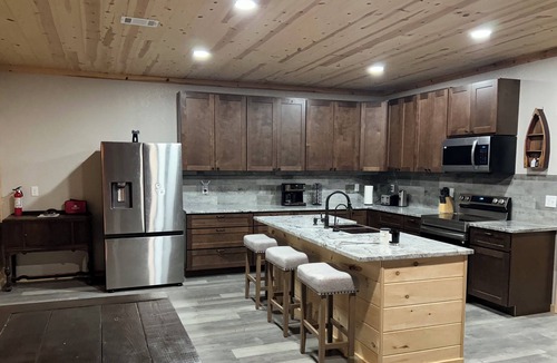 Poughkeepsie House | 5 BR Strawberry River retreat with huge sandbar, float access, & 37 scenic acres