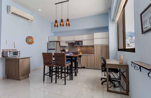 Emiliano Zapata Condo | 5 min to Los Muertos Beach in front of Cuale River located in Isla Cuale! 1BD Co
