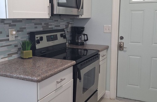 Naples Park House | 5 O'Clock Somewhere getaway-Walk/Bike to Beach,Shops ,Fenced private doggie area